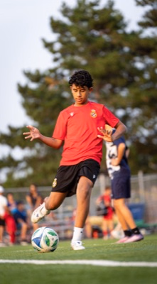 Pro Stars FC player controlling the ball during warm-ups