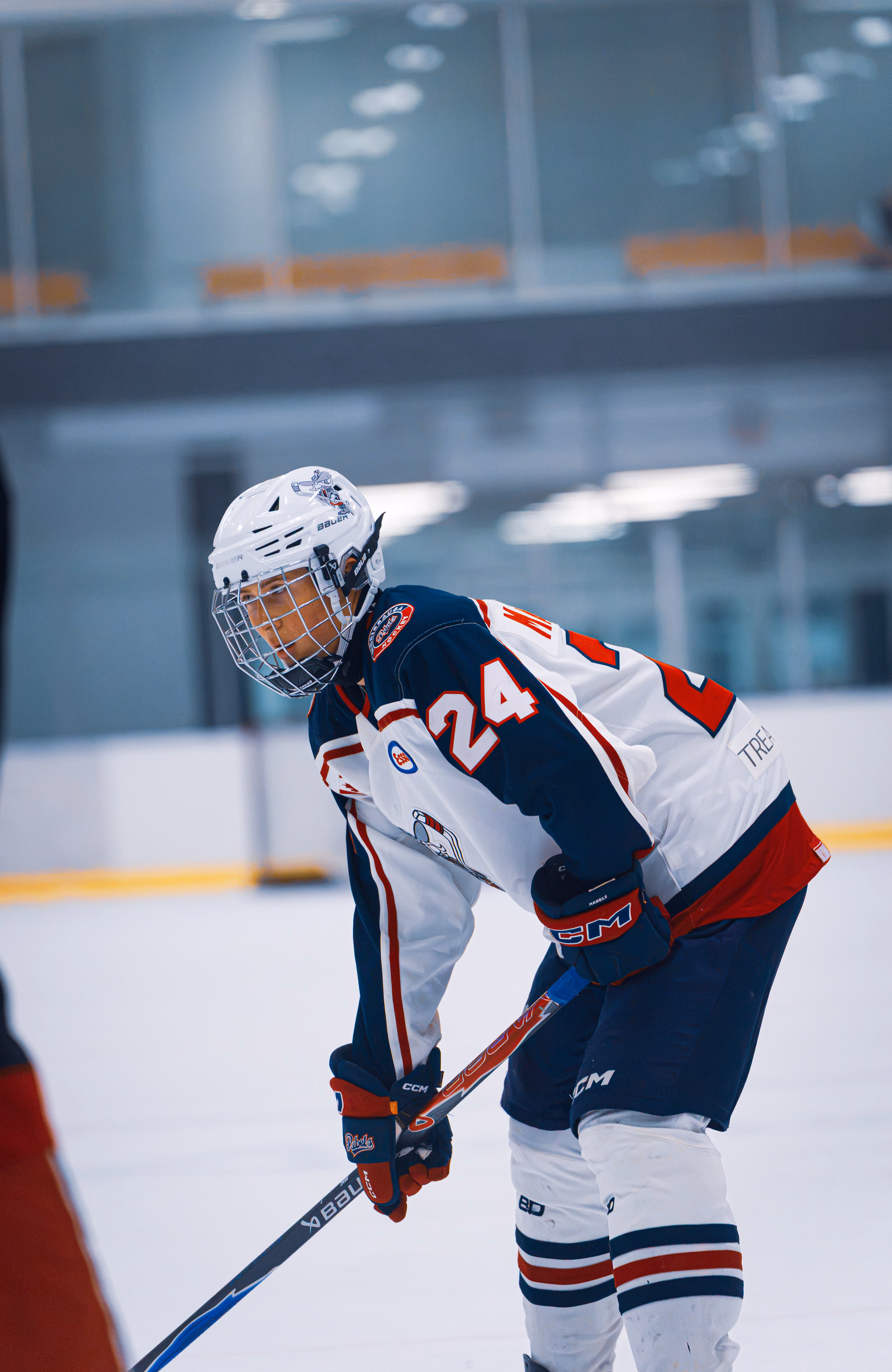 Rebels AAA hockey player wearing number 24 ready on the ice